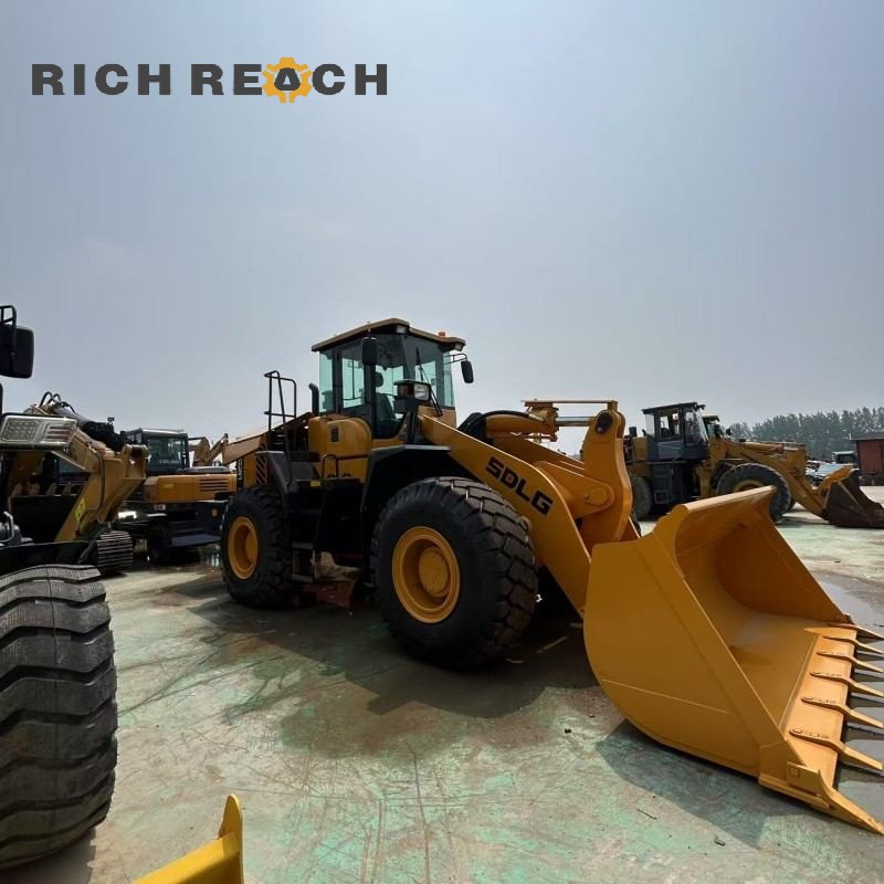 Side profile of a 2020 SDLG 956L wheel loader showing the lift arms and bucket, $20,833